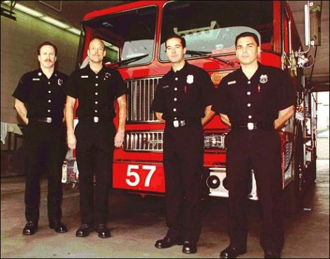 Captain Dupee and his crew in front of fire engine 57.