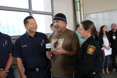firefighters with cardiac survivor