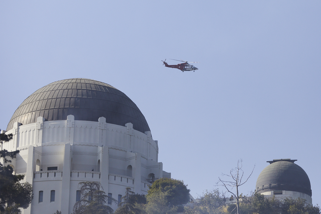 LAFD Helicopter flying over Griffith Observatory