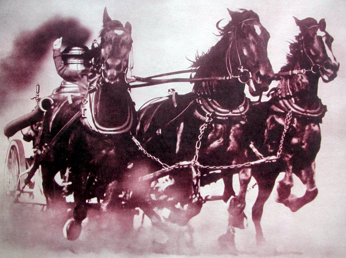 "Engine Company 9 On the Run." Three horses seen running with a fire department steam engine in tow.