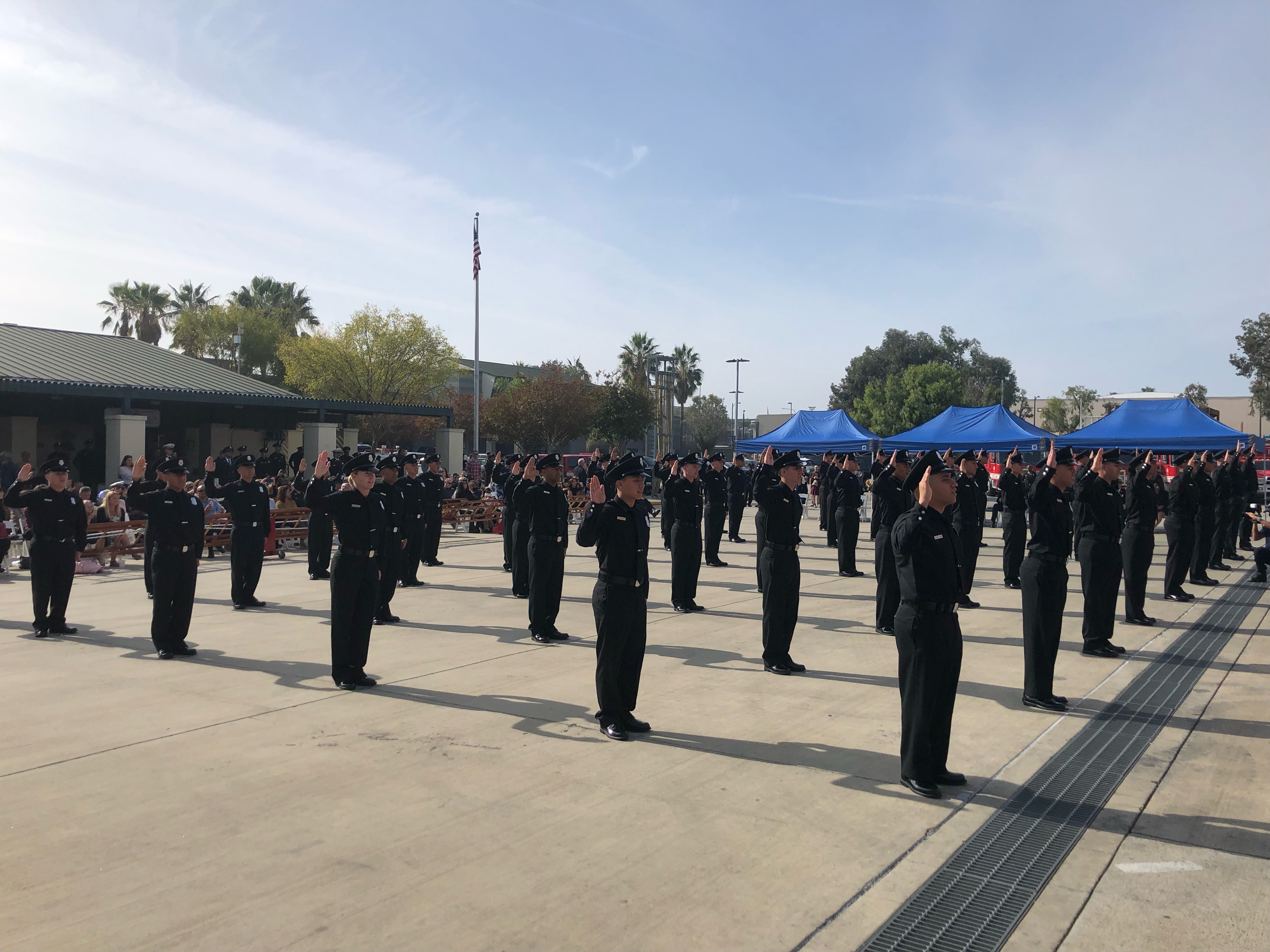 Firefighter Recruits with right hands in the air, reciting the Firefighter Affirmation
